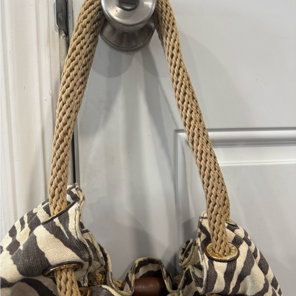 Like new, gently used Michael Kors canvas zebra print tote bag. - Picture 3 of 6